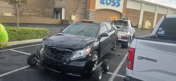 Fast Hook Towing accident recovery — damaged Toyota Avalon