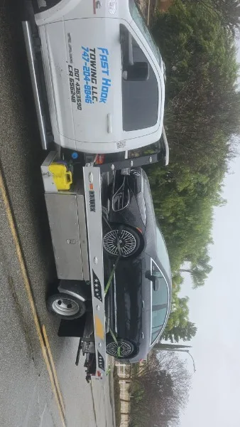 Fast Hook Towing flatbed towing a lowered sport car in Southern California