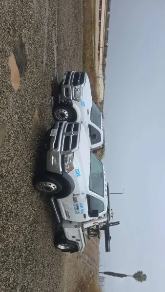 Fast Hook Towing flatbed tow truck side profile view