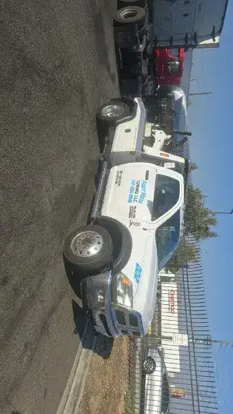 Fast Hook Towing Ram 5500 flatbed tow truck in the Inland Empire