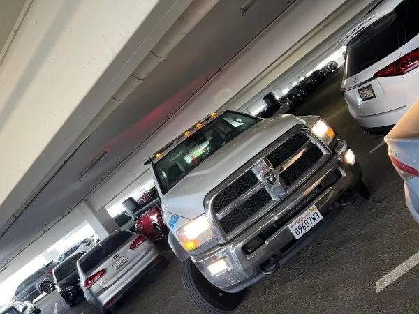 Fast Hook Towing Ram tow truck inside parking structure